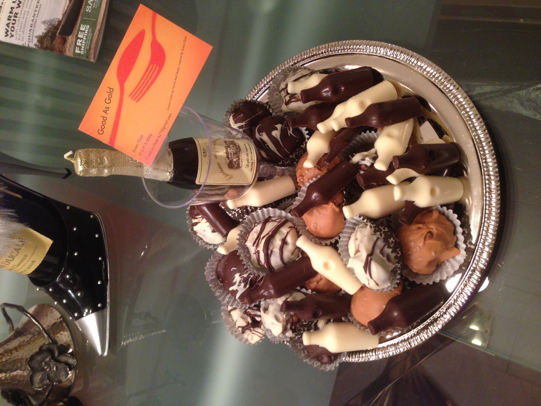 Celebration platter with truffles and molded chocolate bottles
